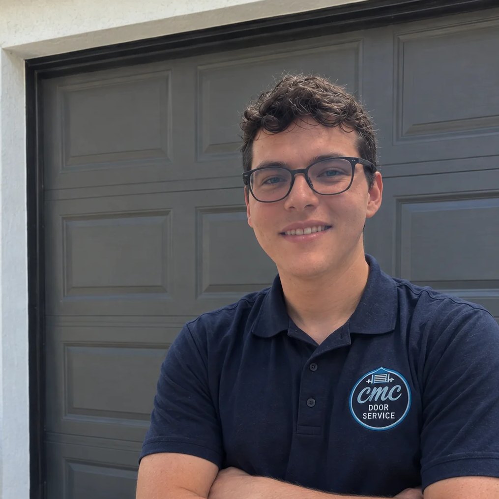Christian Esparragoza, owner of CMC Door Service, in a company polo